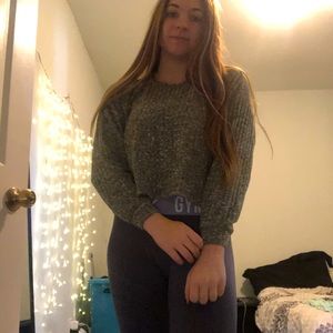 Cropped thin grey sweater. No rips or stains. Size small.